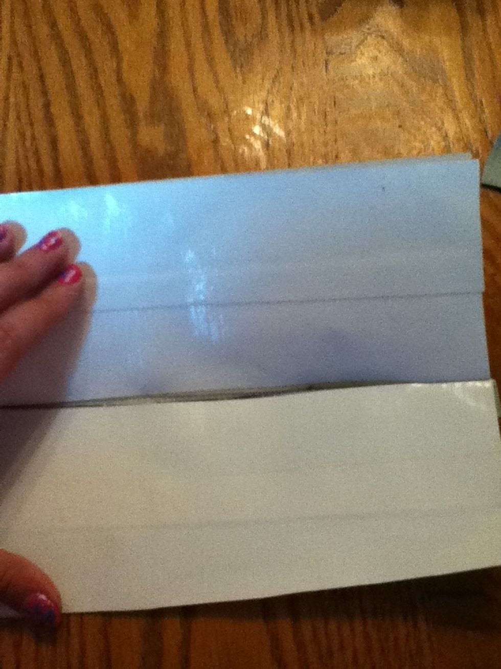 Take one of the half strips put everything in it and fold it