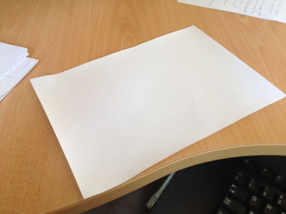 Take one of the papers, lay them on the desk.