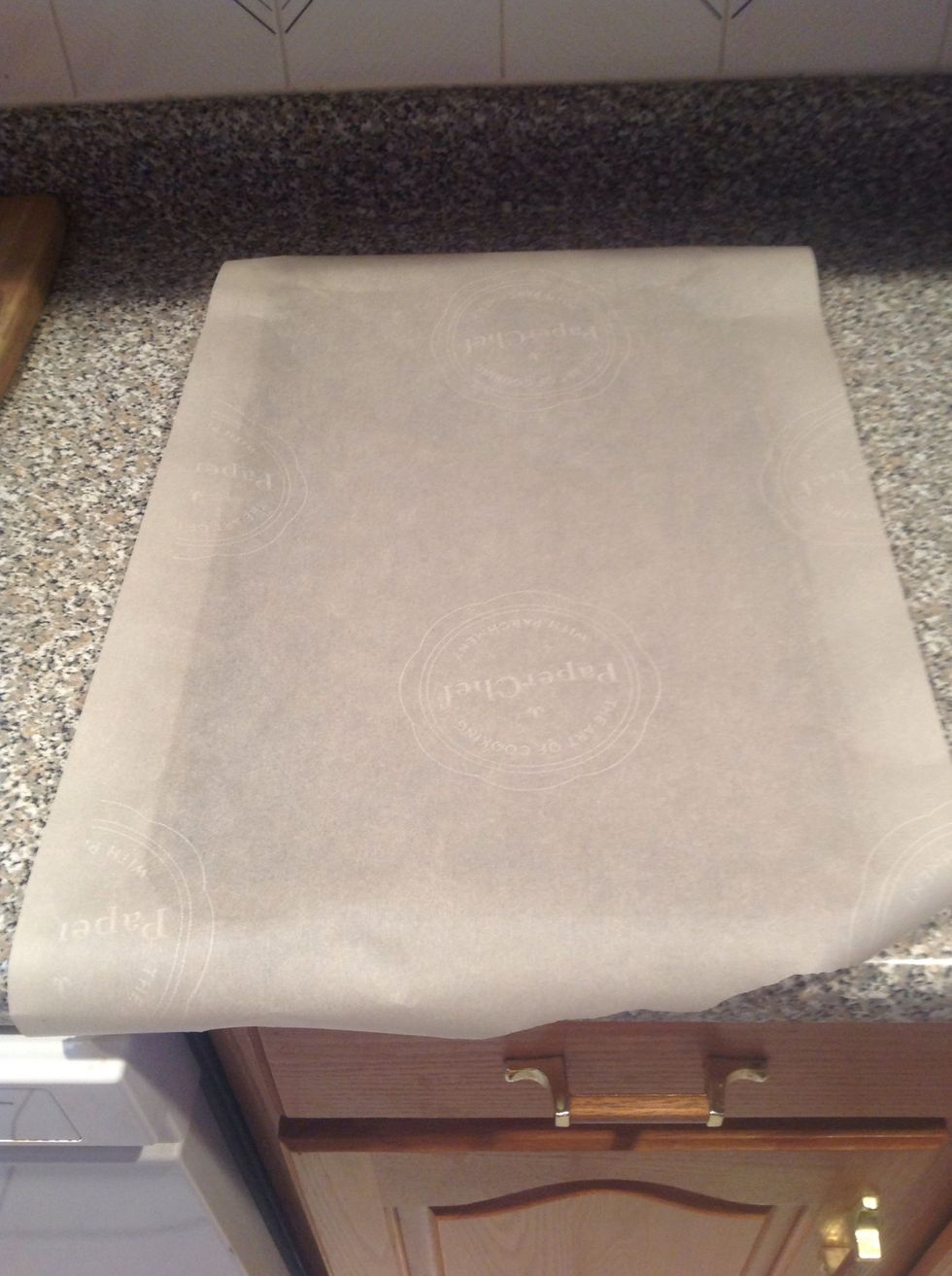 Take one of your beat up baking pans and line it with parchment paper When you're done, the pan can go back to where you keep it, completely clean and dry.