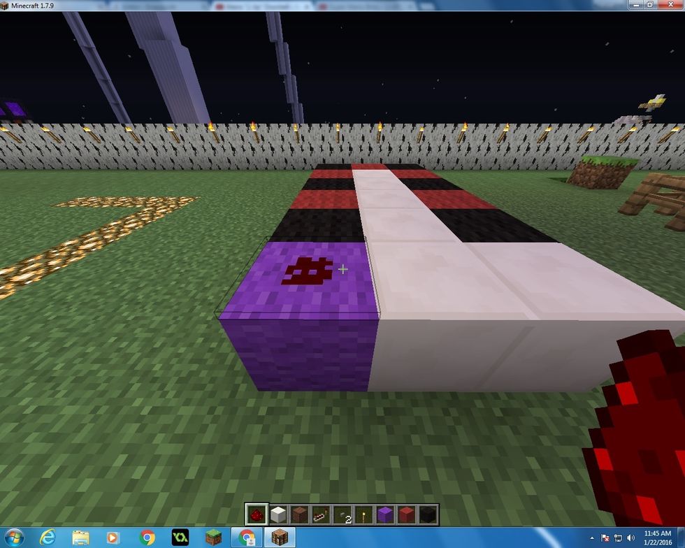 Take one of your Redstone and place it on the block of Purple Wool.
