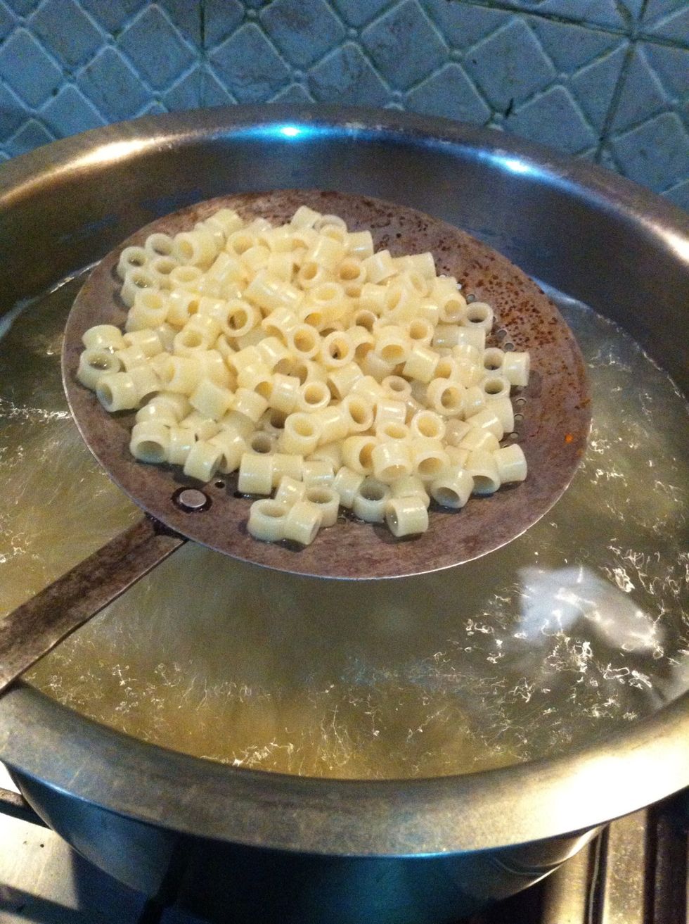 take one out and check.. if it is properly cooked than time drain out water