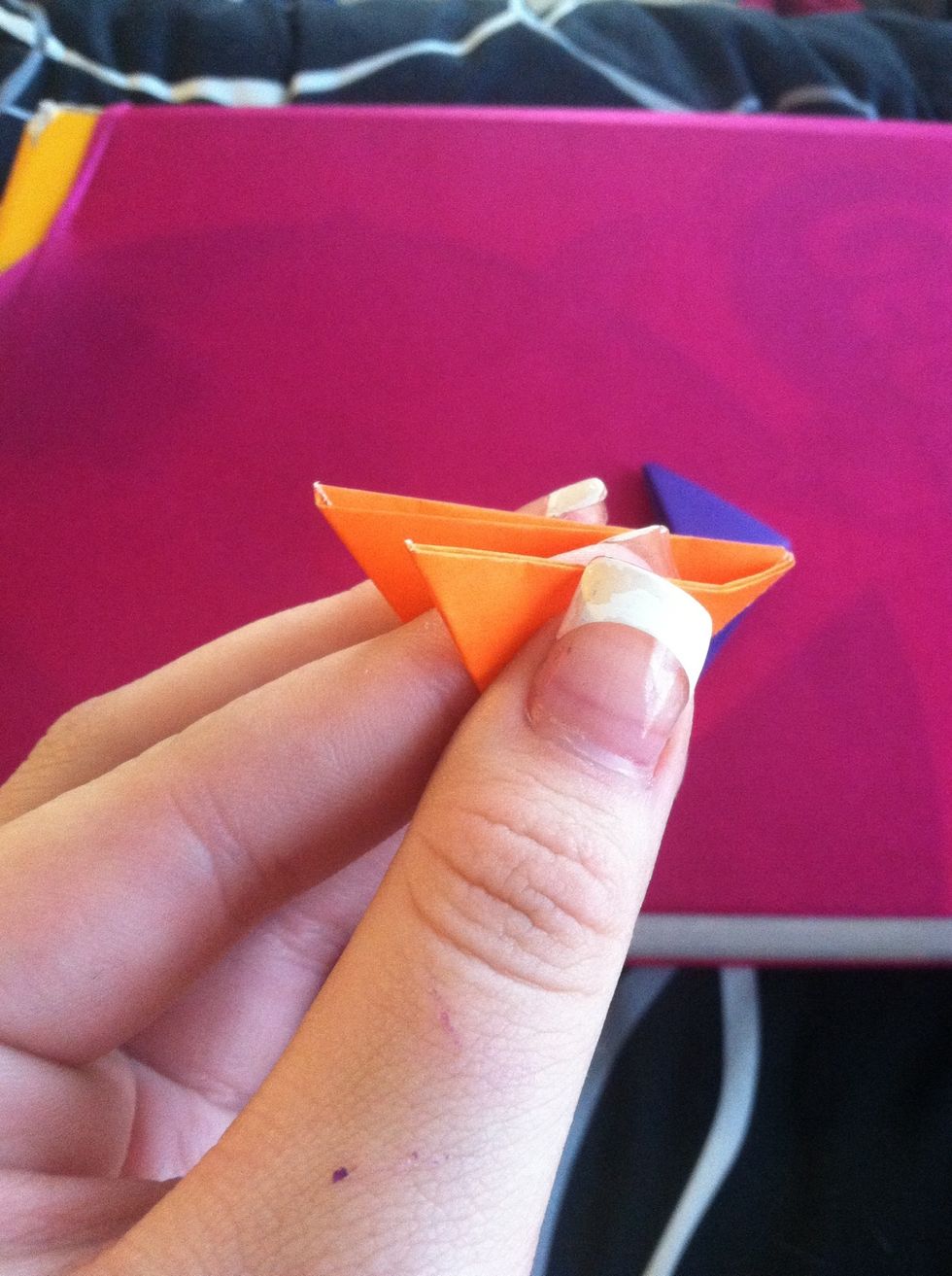 Take one piece and hold the flaps