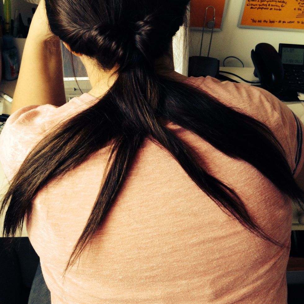 Take one piece from the right side and flip it to the right and then one piece from the left side (over the piece of hair you just brought to the left side ) and bring it to the right.