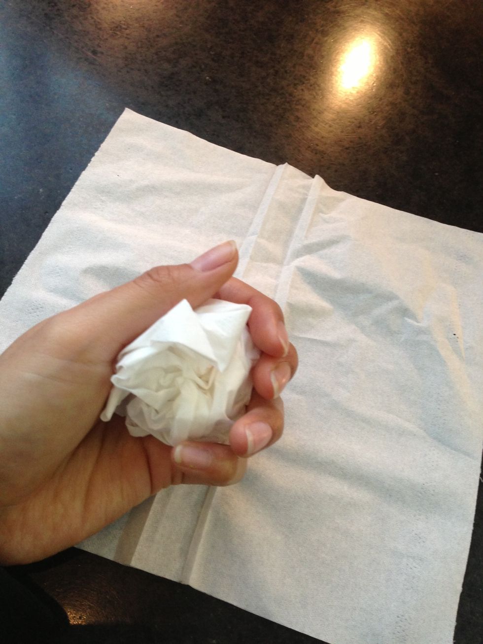 Take one side and squish it into a ball