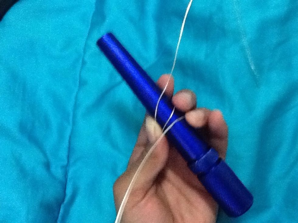Take one side of the wire and wrap it around the mandrel until it looks like this \u2b06\ufe0f
