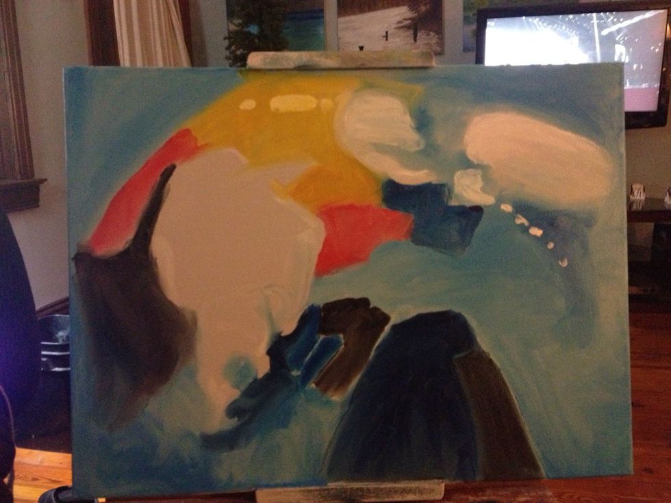 Take other brights in red, yellow, and white to help frame the face. The video is a moving abstract work of art, and your fingerpainting should reflect that movement.