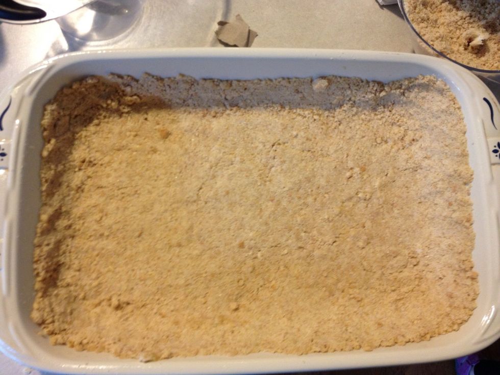 Take out 1 cup of the crust mixture for the topping later. Pat the rest in the bottom of the pan and up the sides a little too. Bake in 350\u2022 oven for 10 minutes