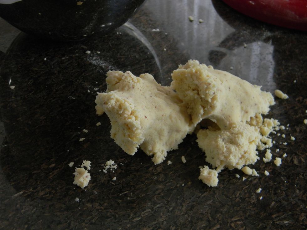 take out a handful or two of the dough and put it on your working surface.
