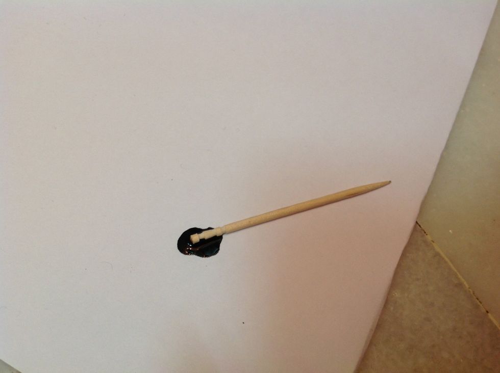 Take out a little amount of black polish on a piece of paper!