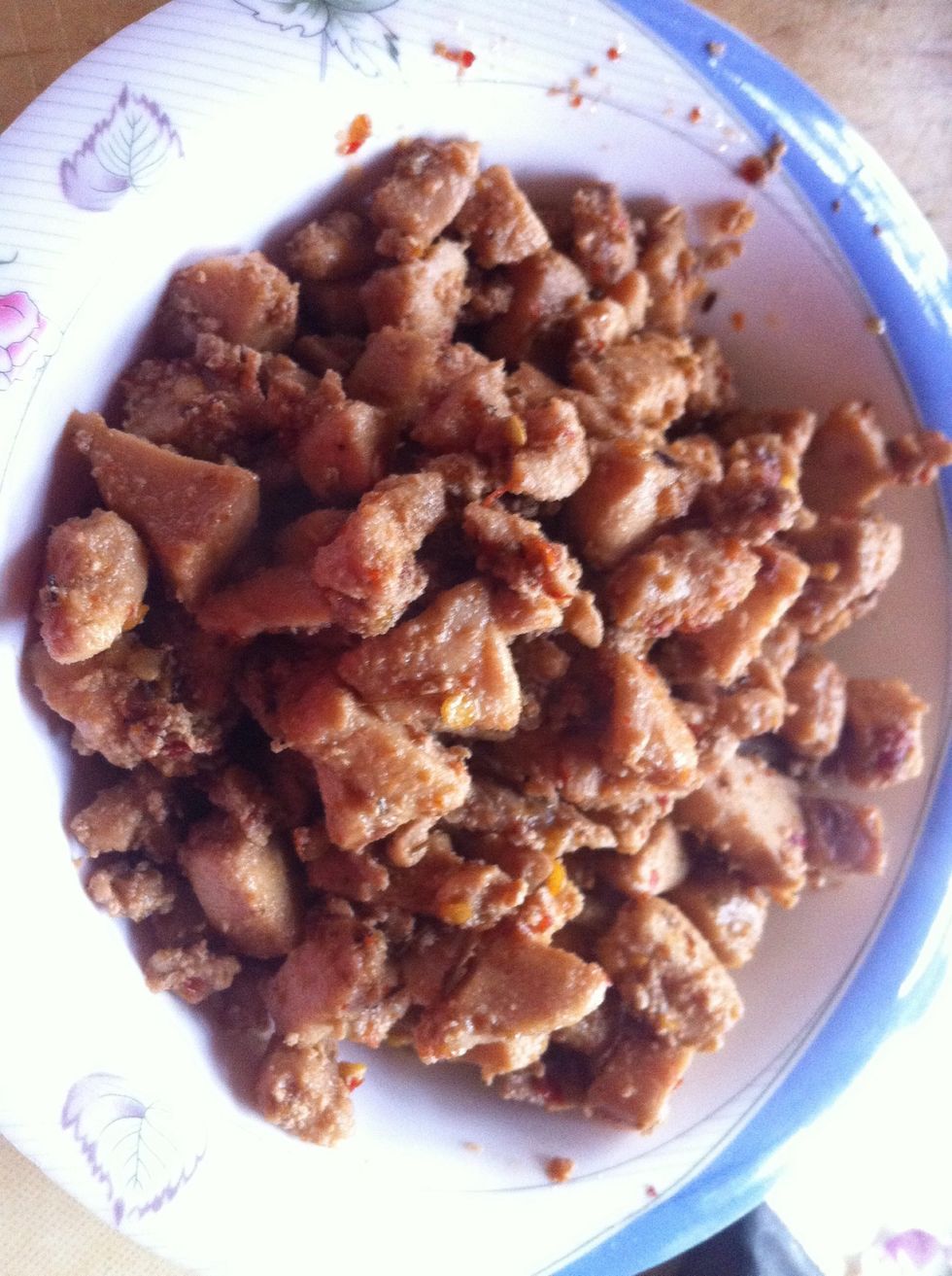 take out fried chicken and in same oil saut\u00e9 onions and capsicum