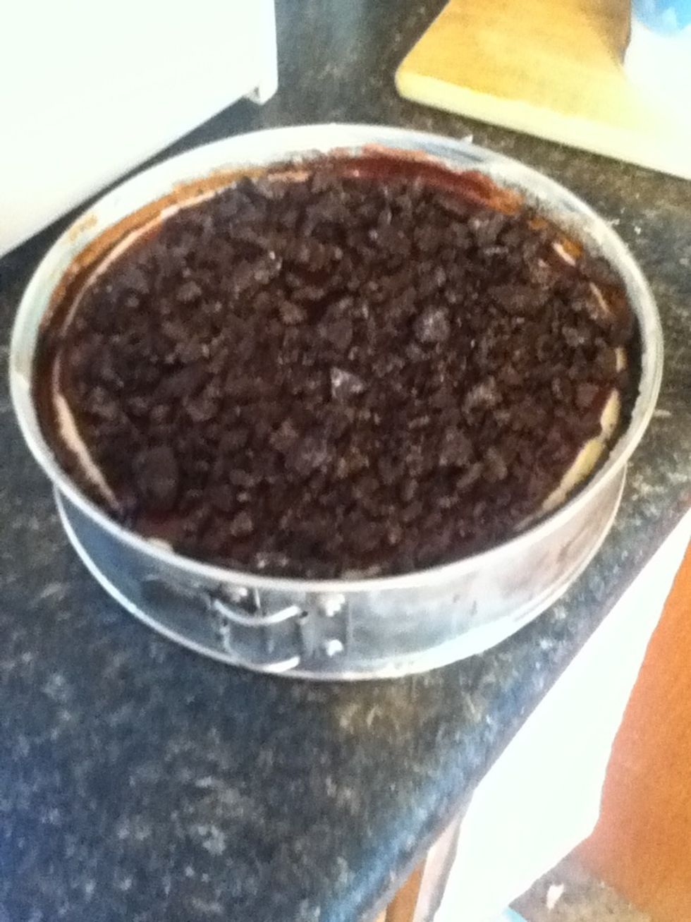 Take out of springform pan, decorate how you'd like, I kept it I'm the pan for a whole after I put the Oreos on just so it would say neat on top. You can do differently if you would like!