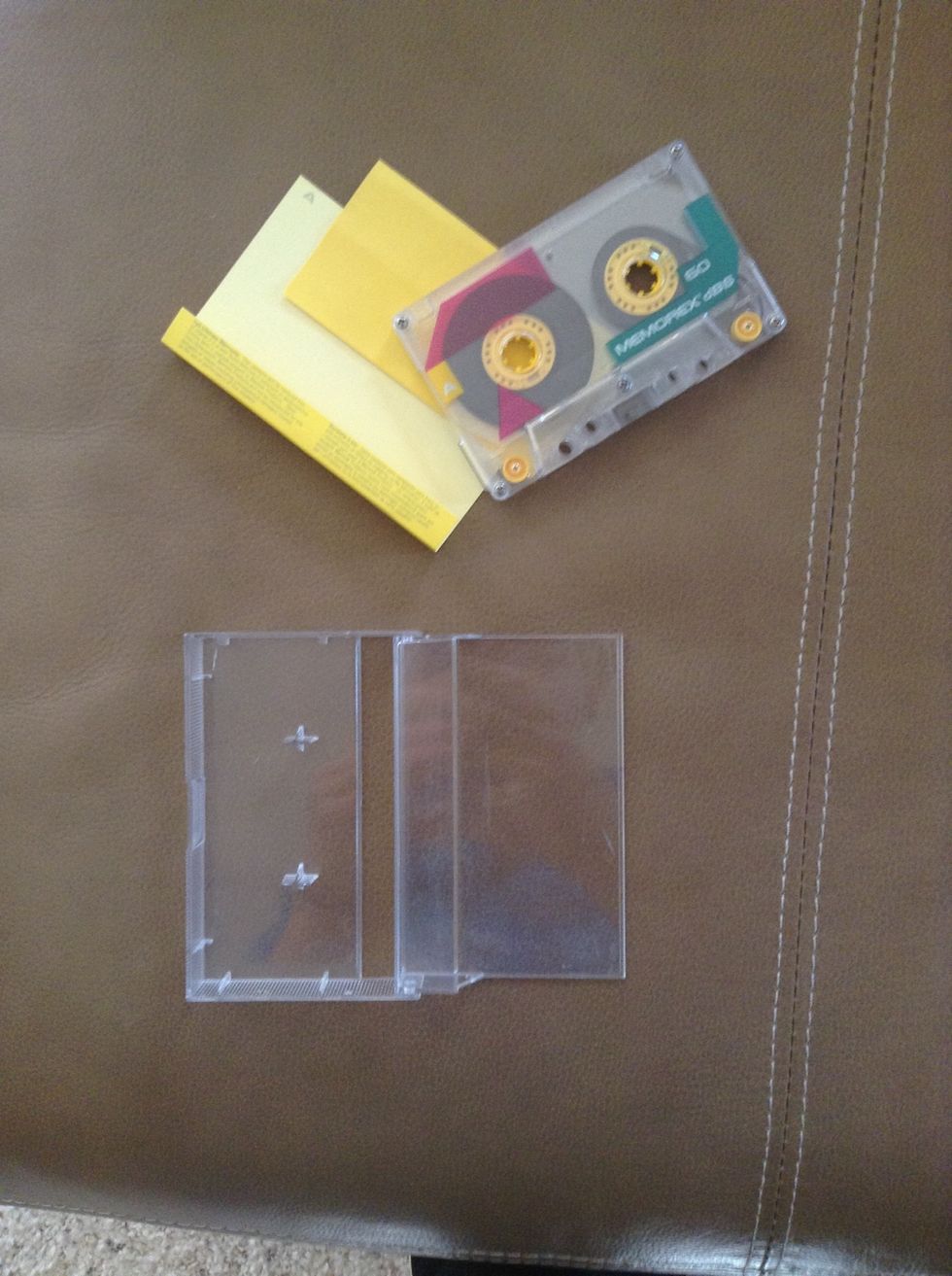 Take out the cassette tape, and any additional papers or labels.