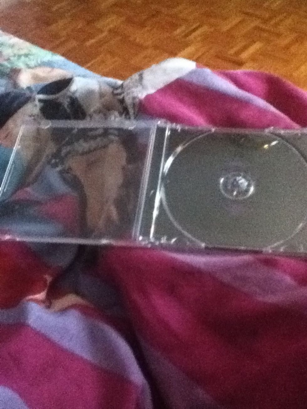 Take out the cd,booklet and flyers.