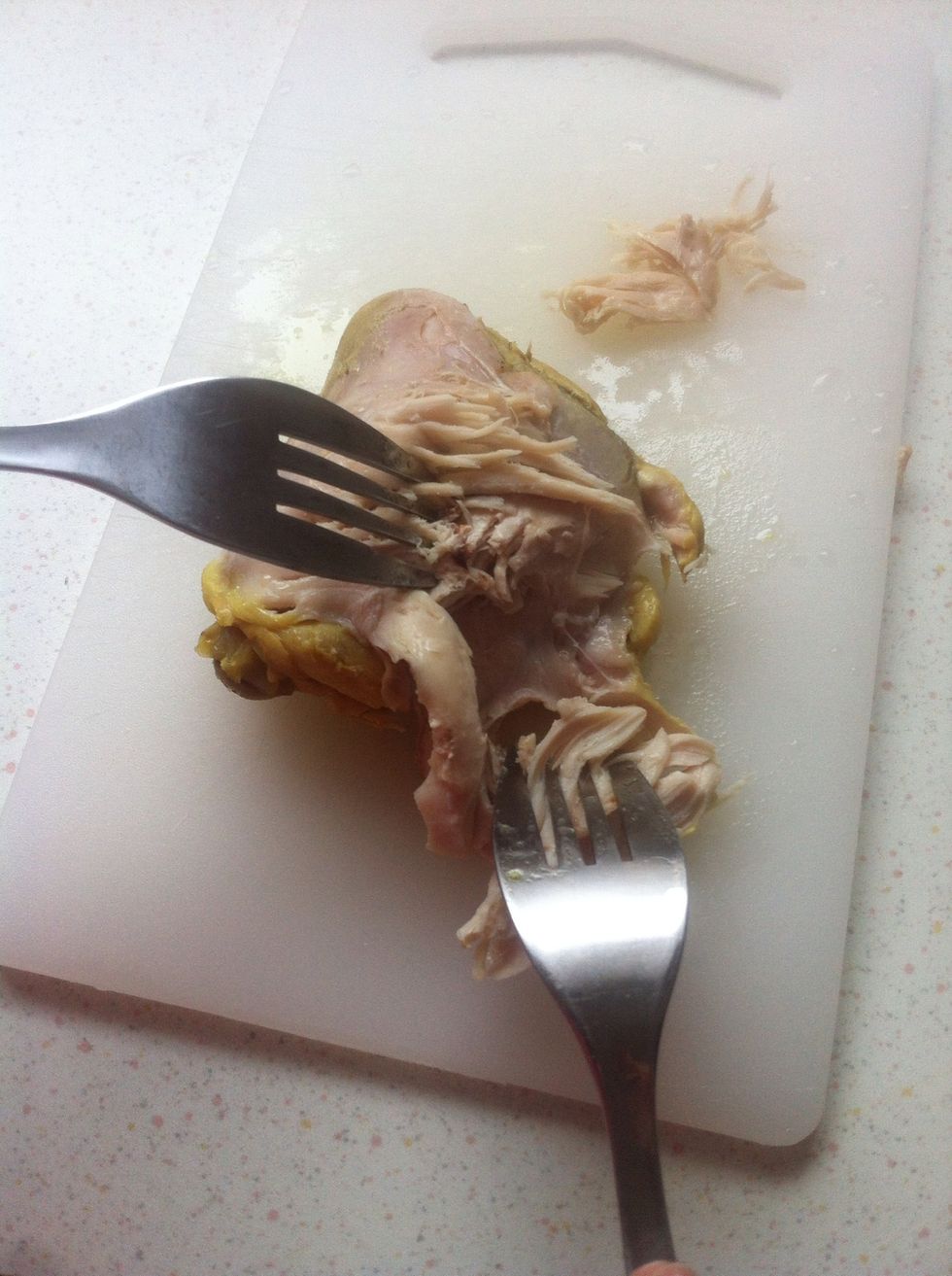 Take out the chicken too and shredded. If you like you can also pan fry them to make it crispy.