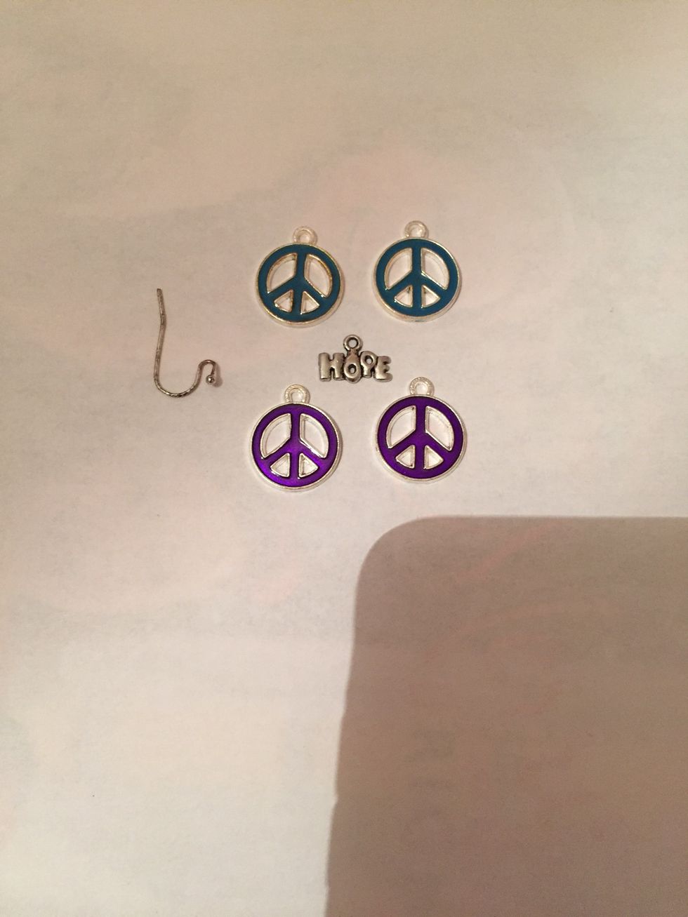 Take out the dangly part of the earring and the charms from earlier.