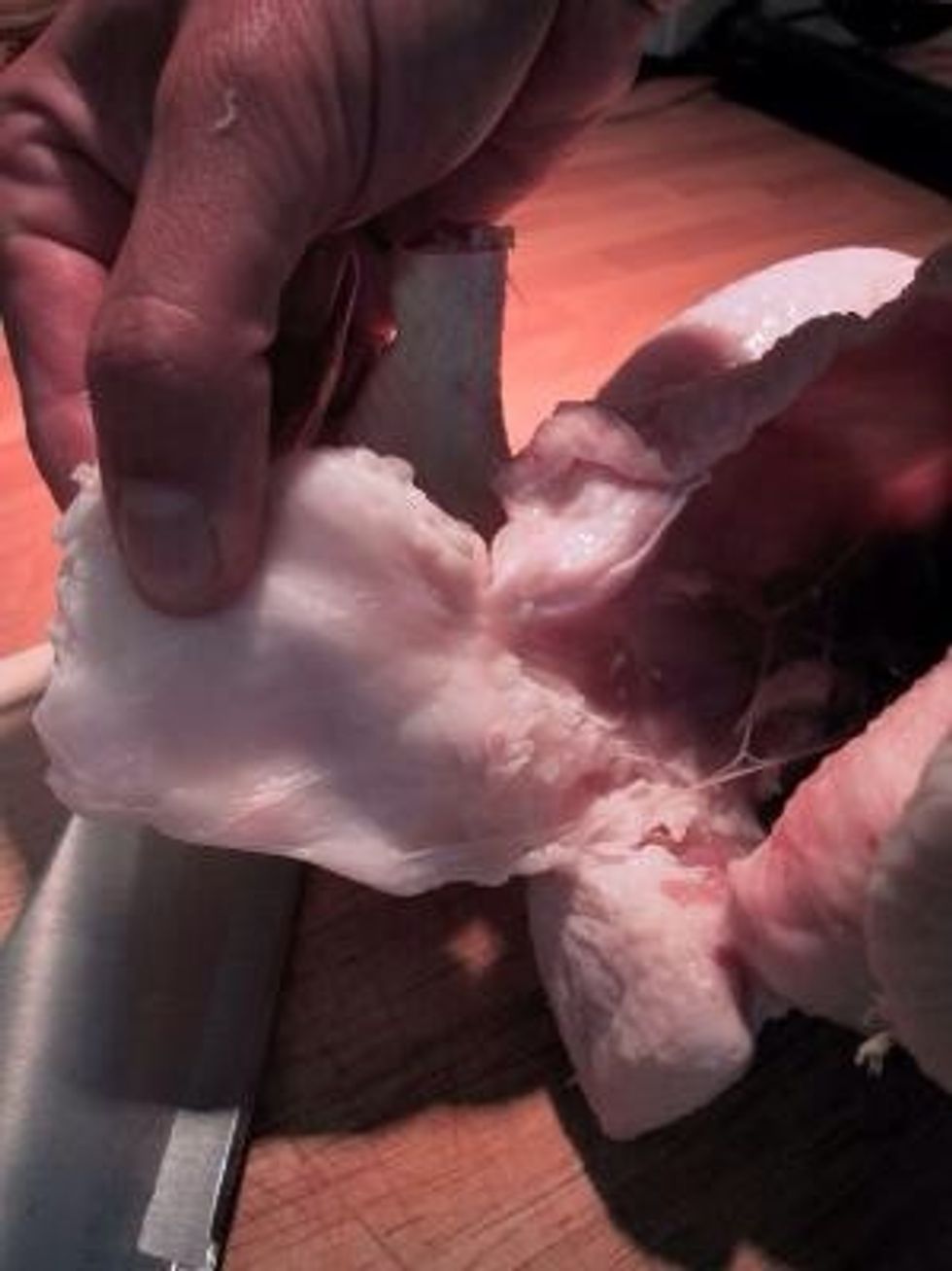 Take out the fatty bits inside the chicken