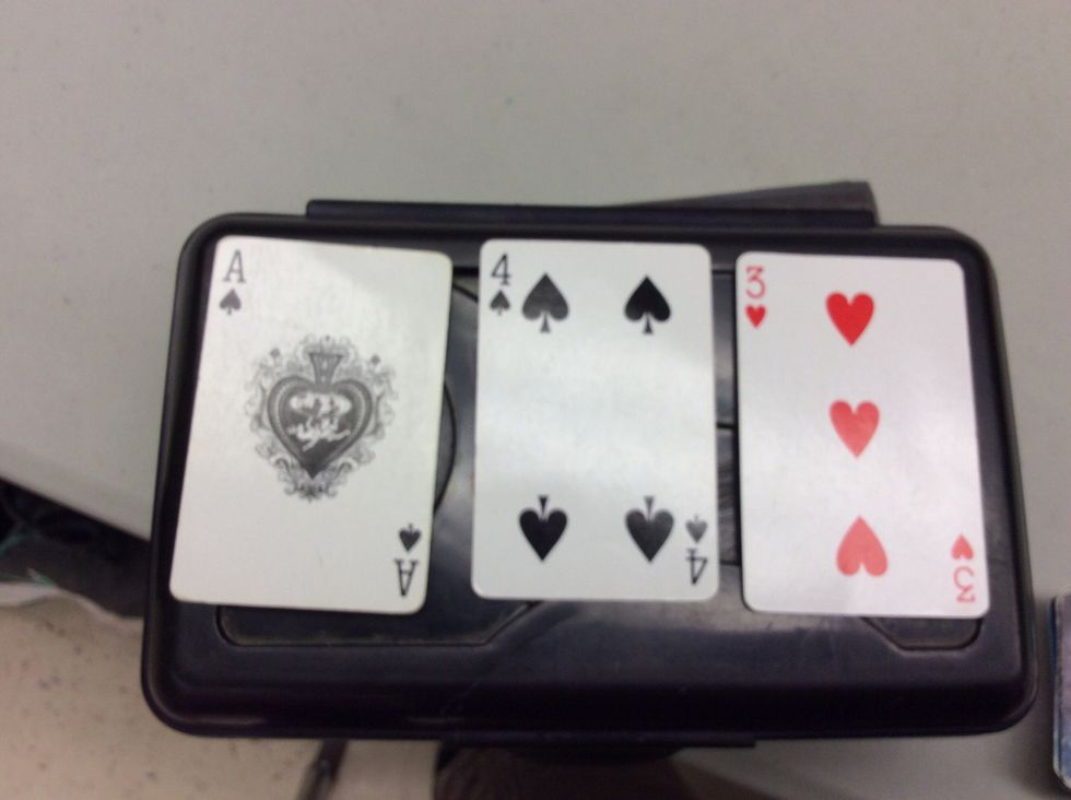 Take out three cards. (It doesn't matter what they are.)