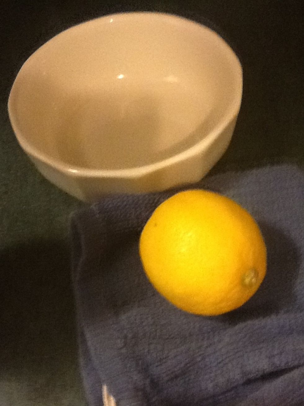Take out your lemon, rag, and microwaveable bowl.