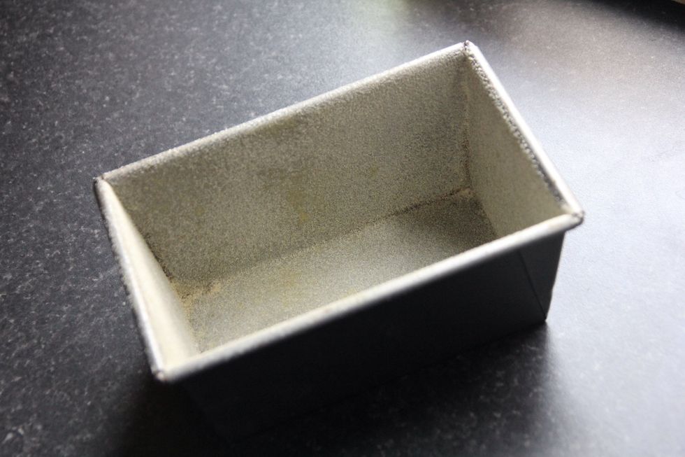 Take out your loaf tin and oil the bottom and sides. Realistically it shouldn't stick but I flour the sides after spraying them just to be safe!