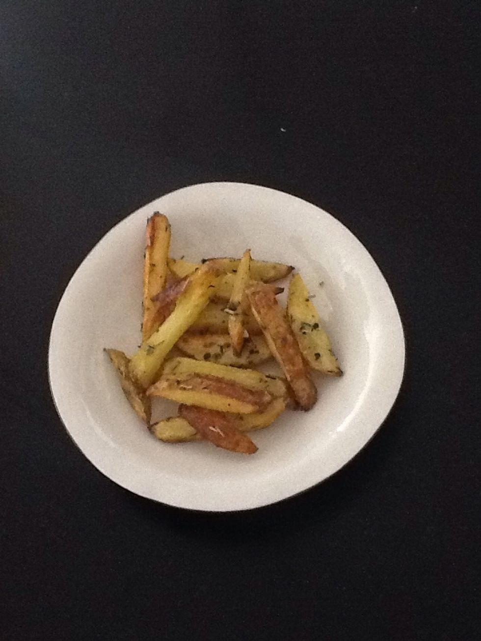 Take out your potatoes from the owen, and add them to a plate
