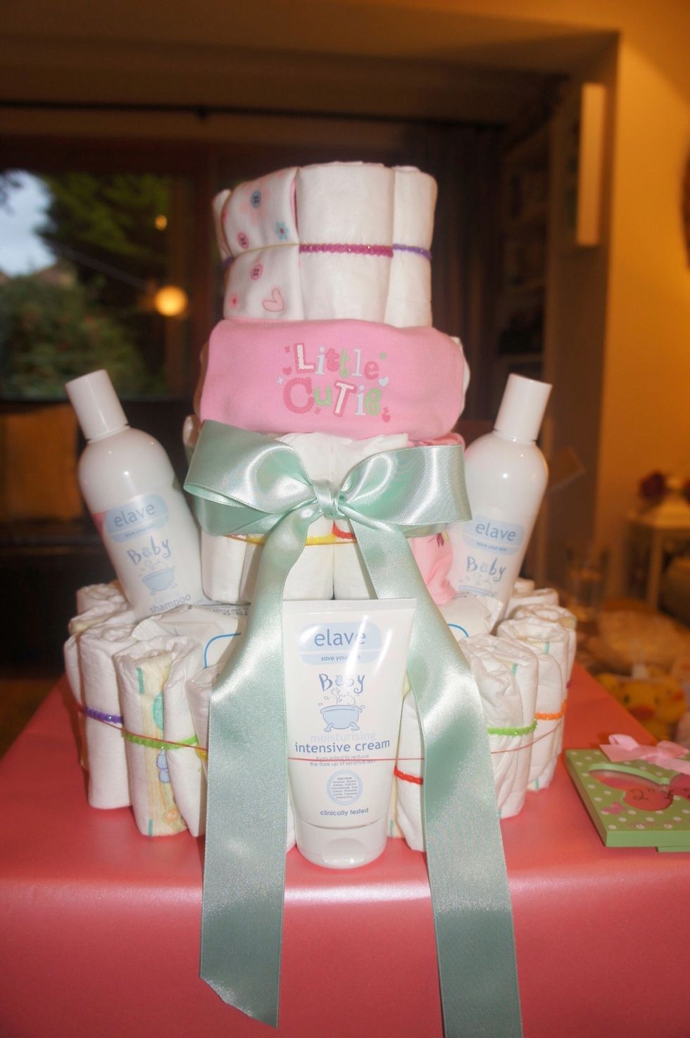 Take out your pretty ribbons. I tried to cover up the elastic bands around the nappy circles as much as possible...