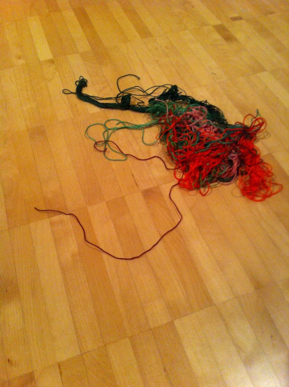 Take out your thread or yarn, preferably in different colors. It should not be too thick.