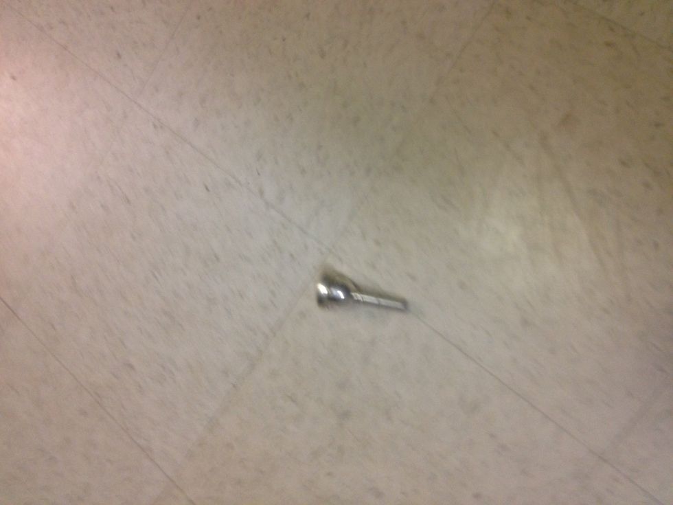 Take put the mouthpiece. It is the smallest piece in the case.