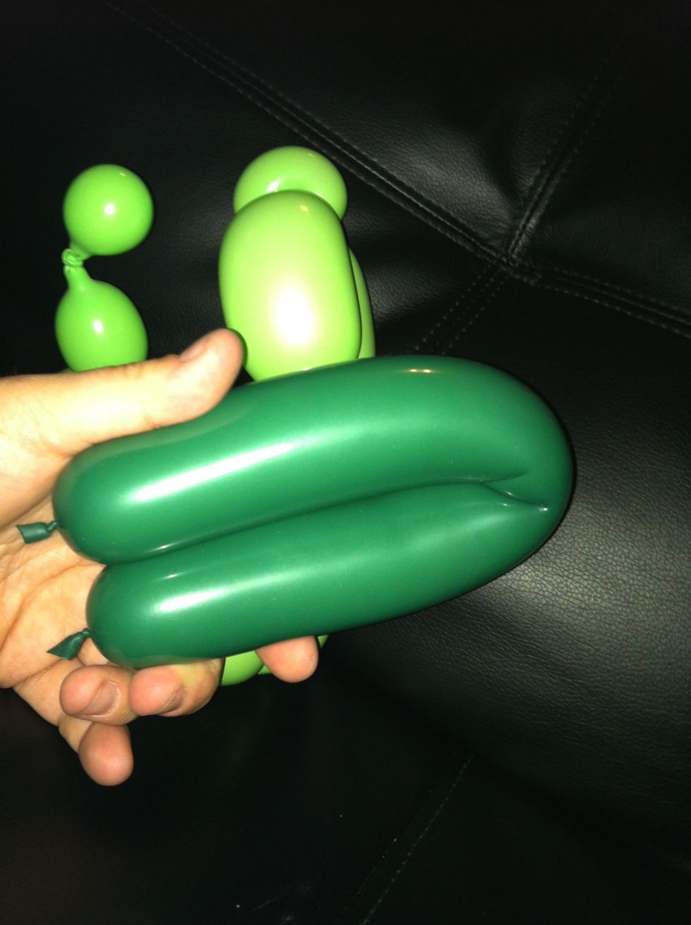 Take second balloon and fold in half