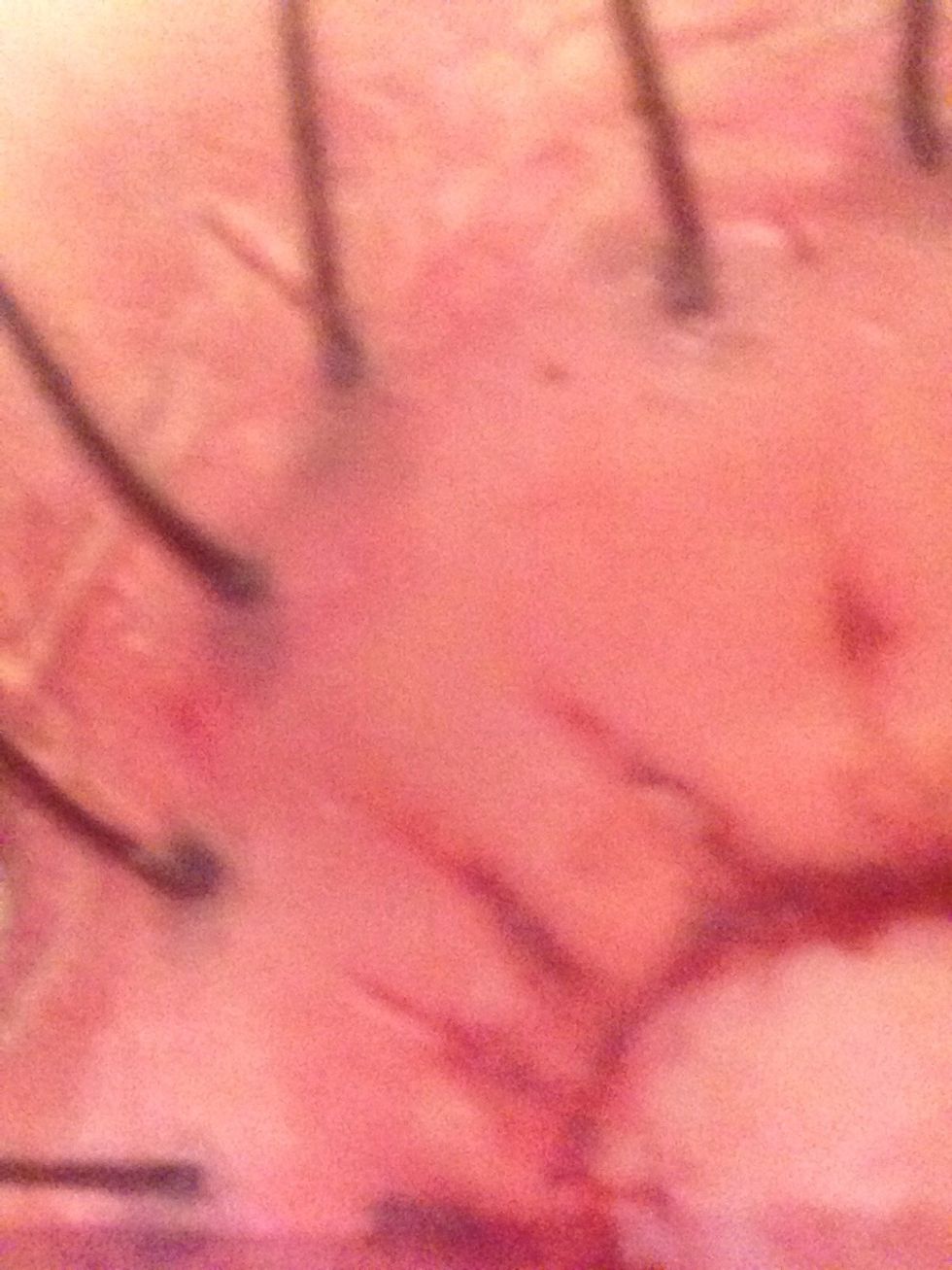 Take some black eyeshadow and apply were the tread-ends are. This makes it look like the tread is going thru your skin