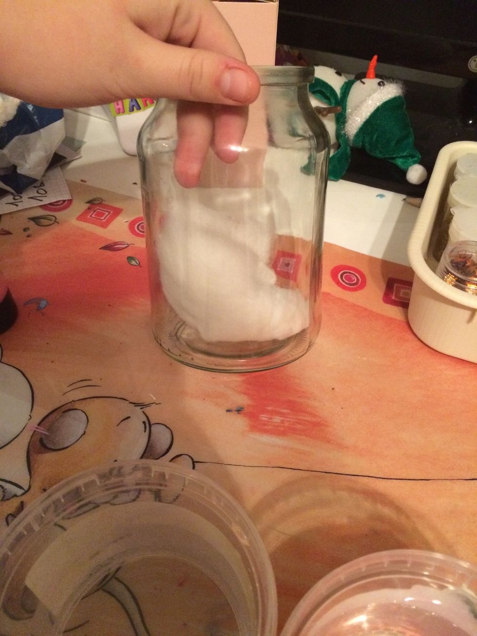 Take some cotton in the jar.