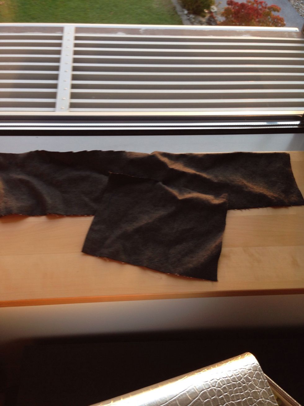 Take some fabric and cut it in order to place it right in the box