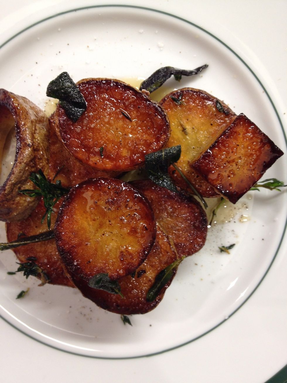 Take some of the fried herbs and add it to the plate.