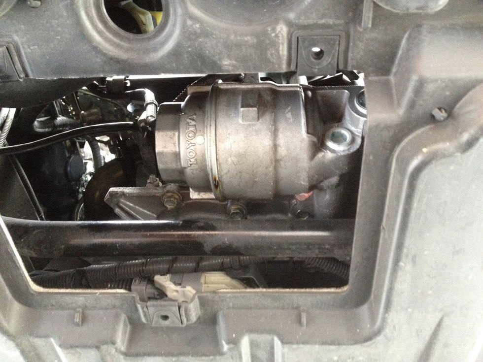 Take some oil and grease the gasket then replace the filter, then replace the cover