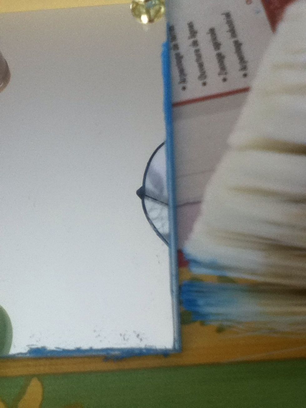 Take some paint and touch delicately the contour of the mirror !