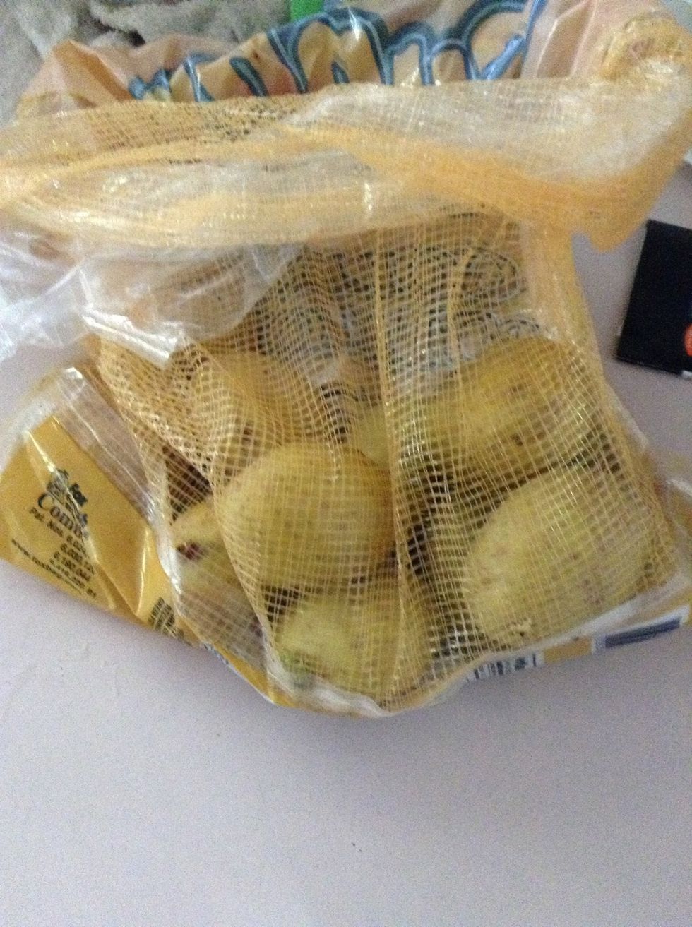 Take some potatoes. I used 12 small potatoes. 6 medium sized potatoes will do.