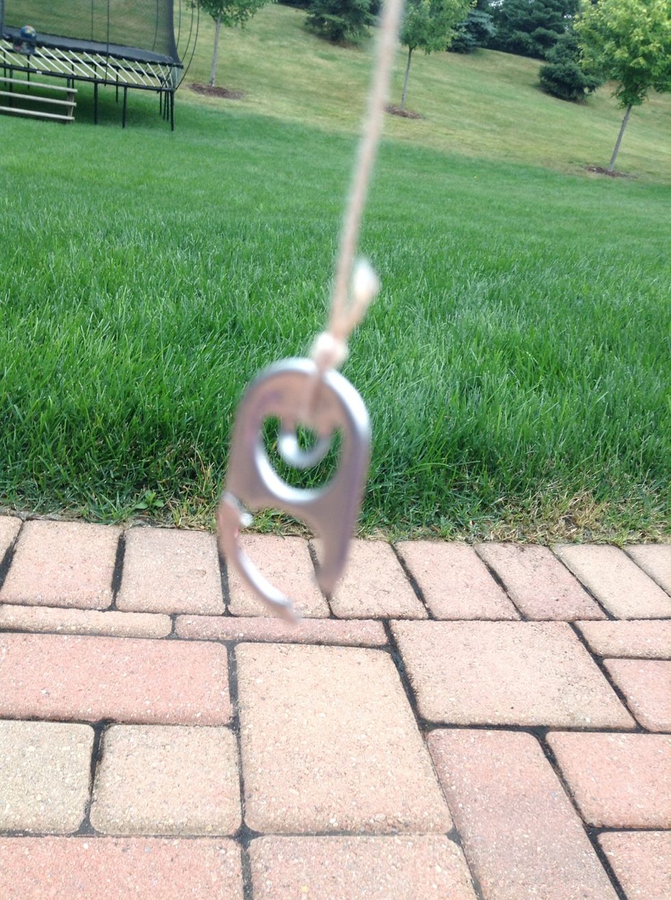 Take some twine or string ( you can make some out of bark) and tie a fishers knot