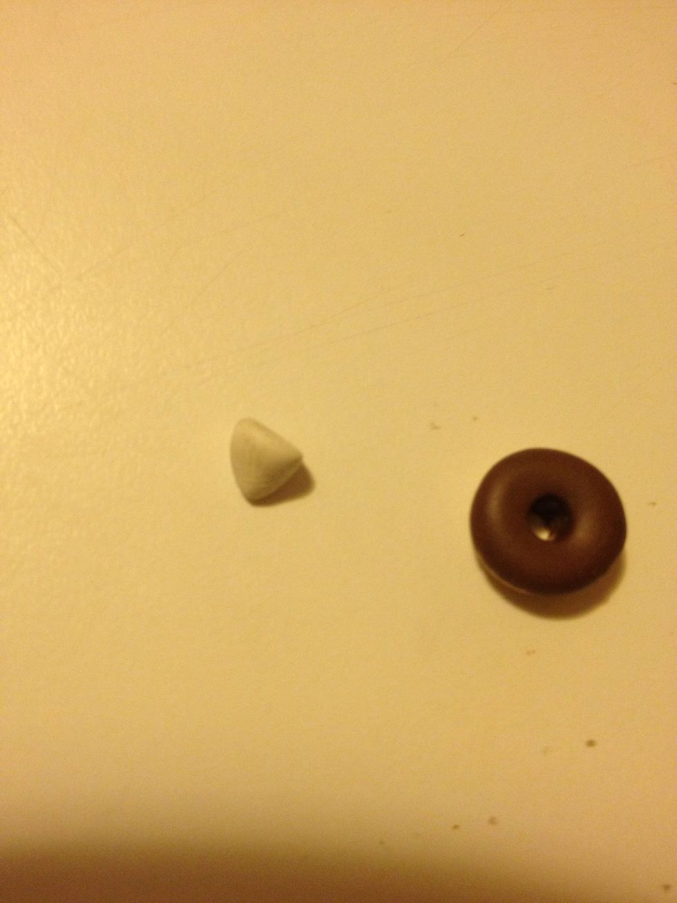 Take some white clay and make a small cone.