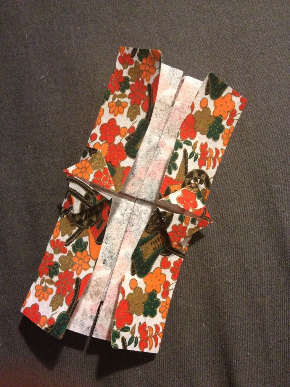 Take that and by using the original guiding lines, fold both sides back