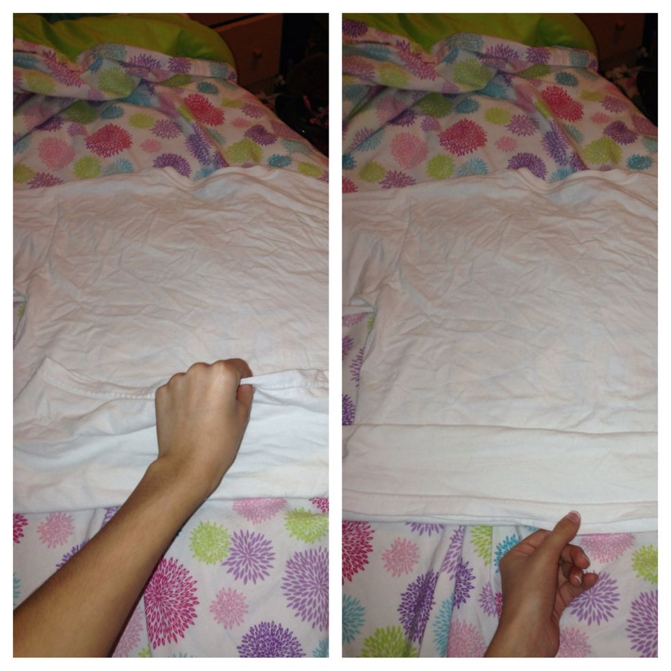 Take that fold and pull it down so that it's folded in half.