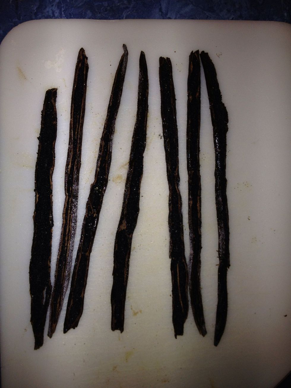 Take the 7 beans and carefully cut a slit in them. take care not to cut all the way through. Open them carefully and flatten the beans on a cutting board..