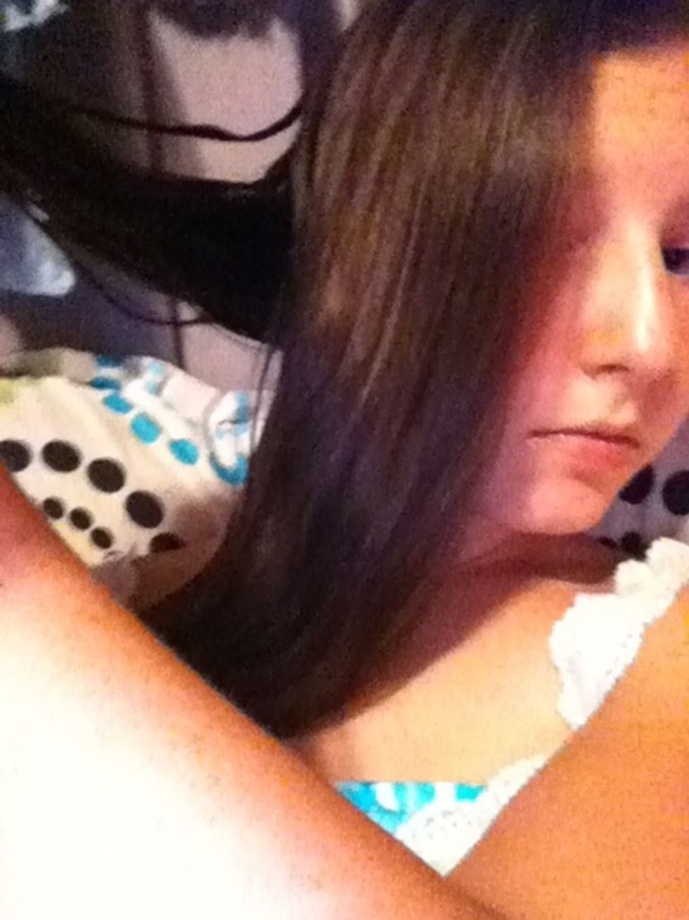 Take the back piece and put it in the place of the front strand. Put the front strand in the back.