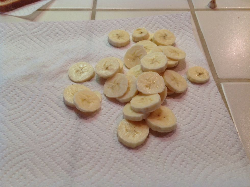 Take the banana, and cut it into slices