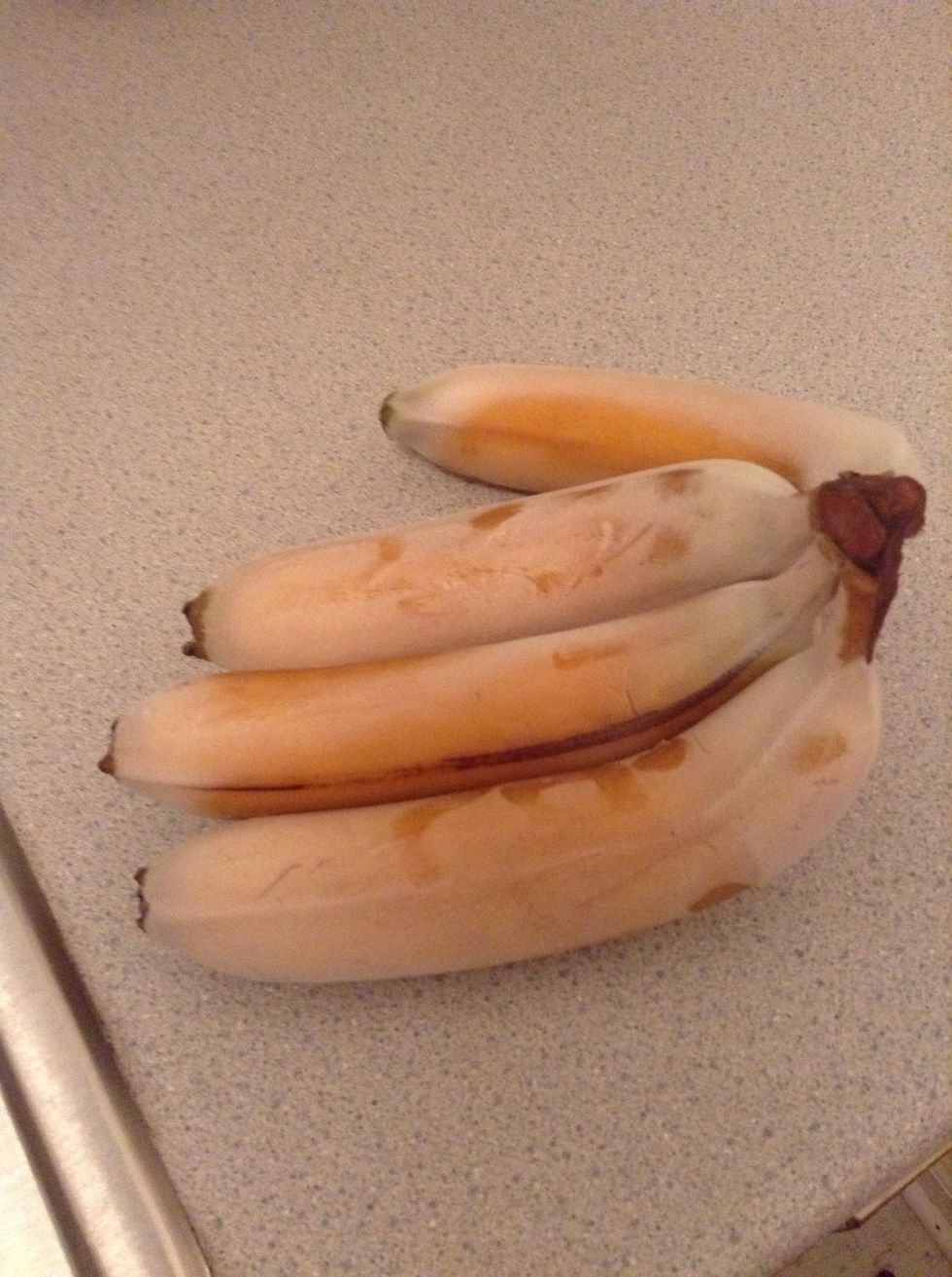Take the bananas out of the freezer after the time.. I left them all night long... But i put them in the microwave for 45 seconds to loosen the peel...