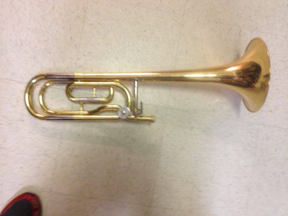 Take the be out of the case and place it on the ground so trigger piece it facing upward. If there is not trigger do not worry about how you put it down.