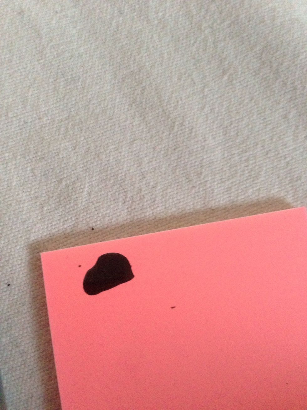 Take the black nail polish, and take some out on the paper!\ud83d\udc8b