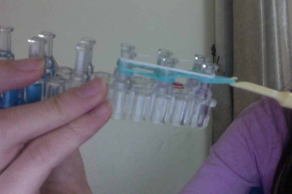 Take the bottom band (the blue '8' bands),