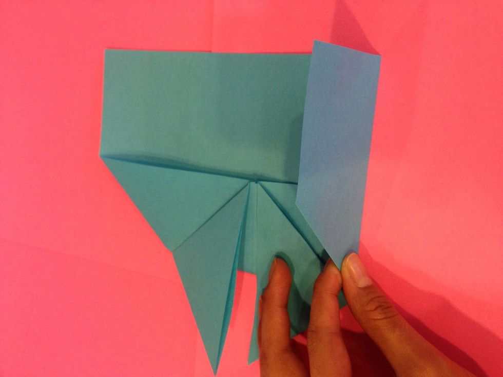 Take the bottom left and fold it over to the center were covering ur secret letter up :)