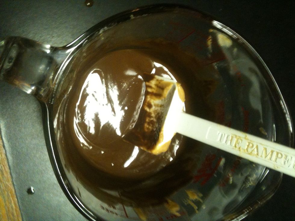 Take the bowl out and mix it together. Add in 1/2 a teaspoon of vanilla and mix it in completely.