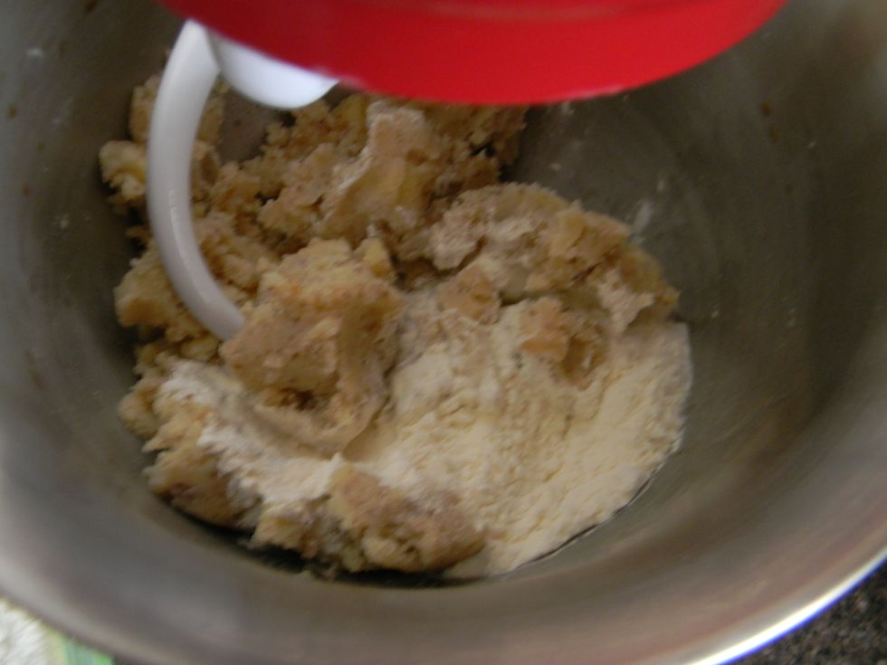 Take the butter out from the fridge and add a cup of flour to it. Knead it until incorporated.
