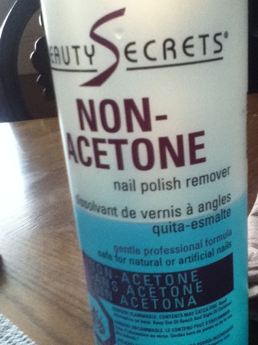 Take the cap of nail polish remover